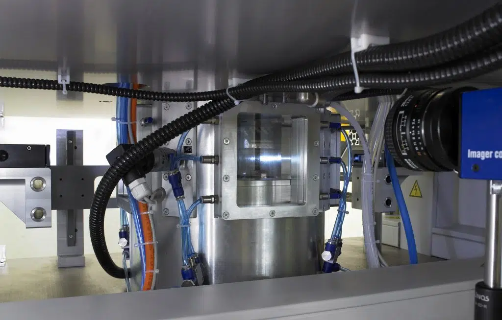 High-speed imaging setup with optical sensors and fluid measurement system